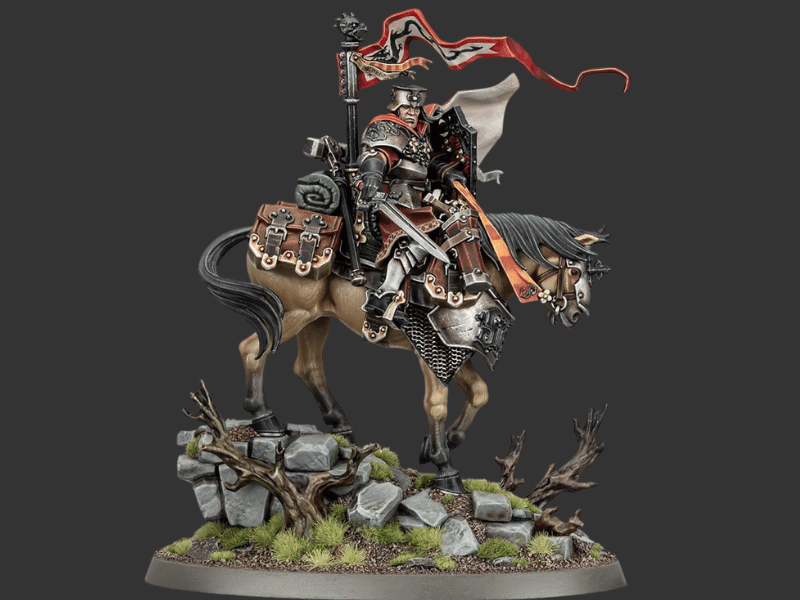 A painted fantasy miniature of an armored knight on a horse, mounted on a rocky base with a red and black flag, shown against a dark gray background.