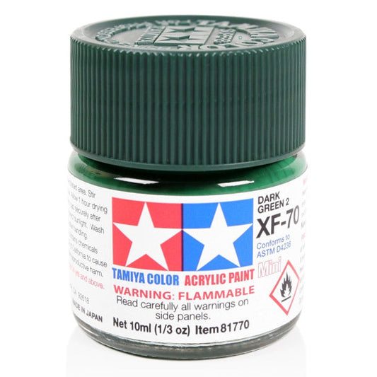 Tamiya dark green acrylic paint jar on a white background