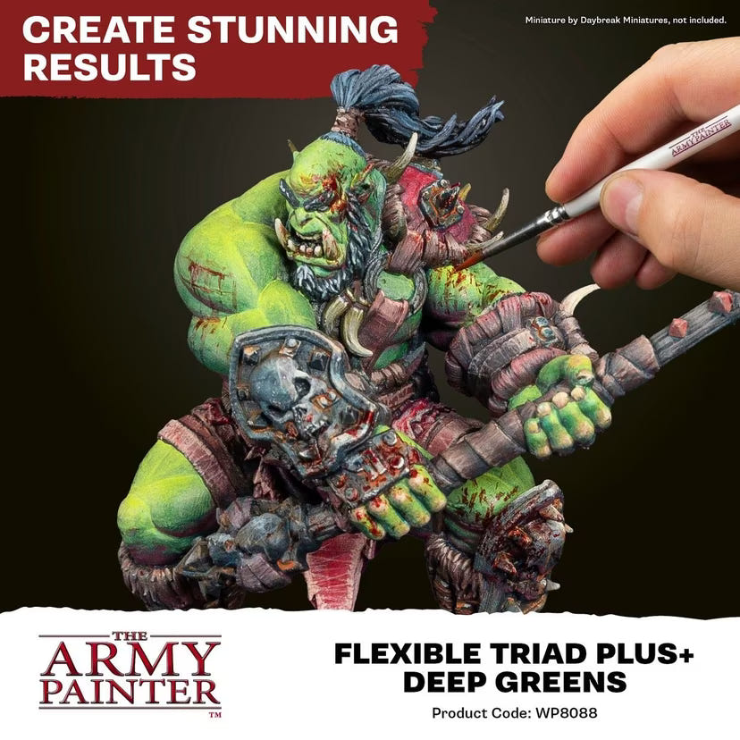 Painted green-skinned orc miniature being highlighted with a brush, Army Painter Deep Greens set