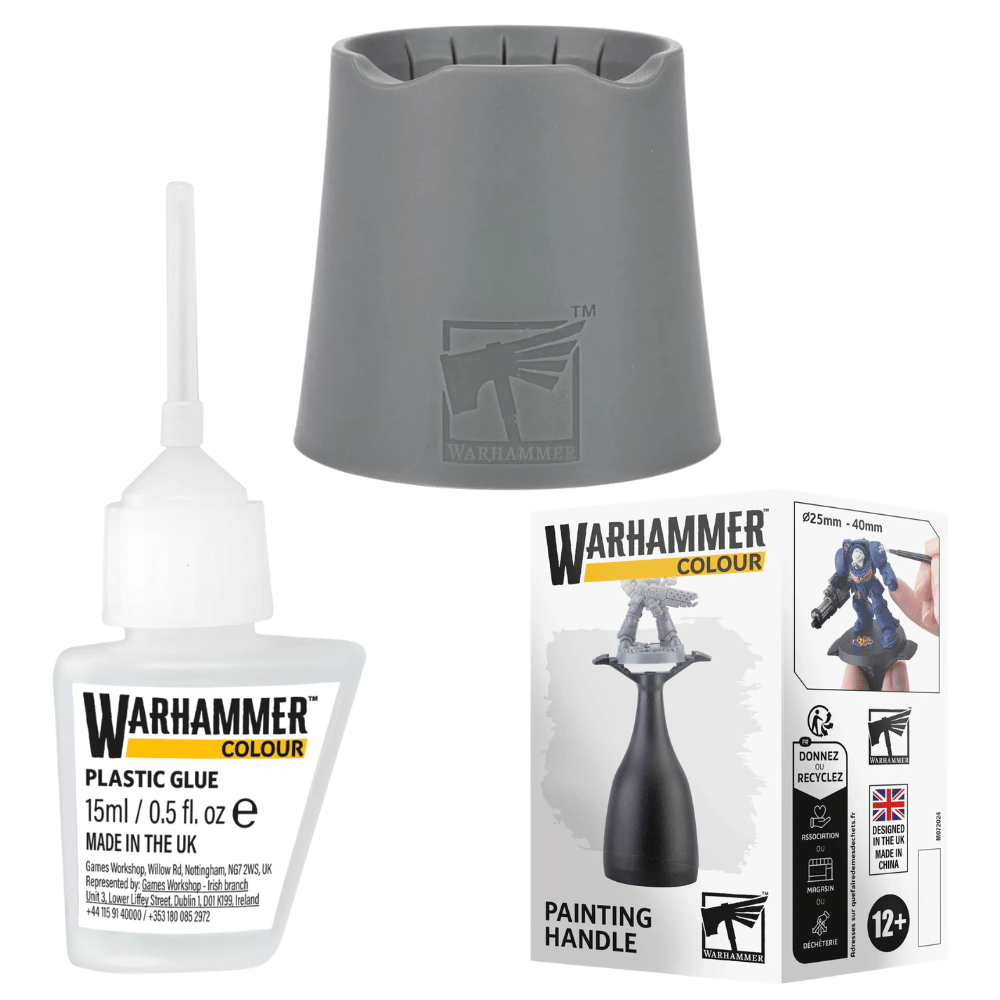 Warhammer product set with plastic glue, painting handle, and color guide on a white background