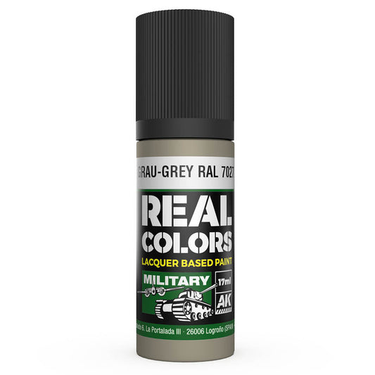 Spray paint can with 'Real Colors' branding on a white background