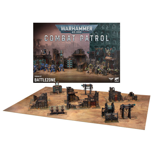 Warhammer 40k Battlezone Combat Patrol miniatures and terrain set displayed on a tan tabletop with the product box behind it, on a white background.