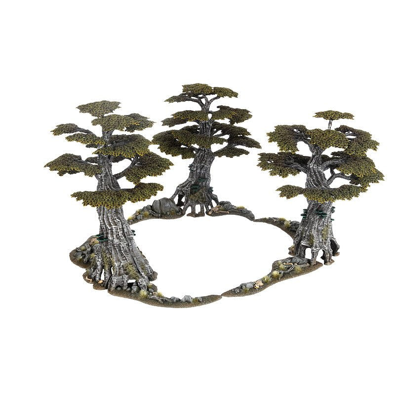 Painted Awakened Wyldwood trees arranged in a ring with connecting root bases