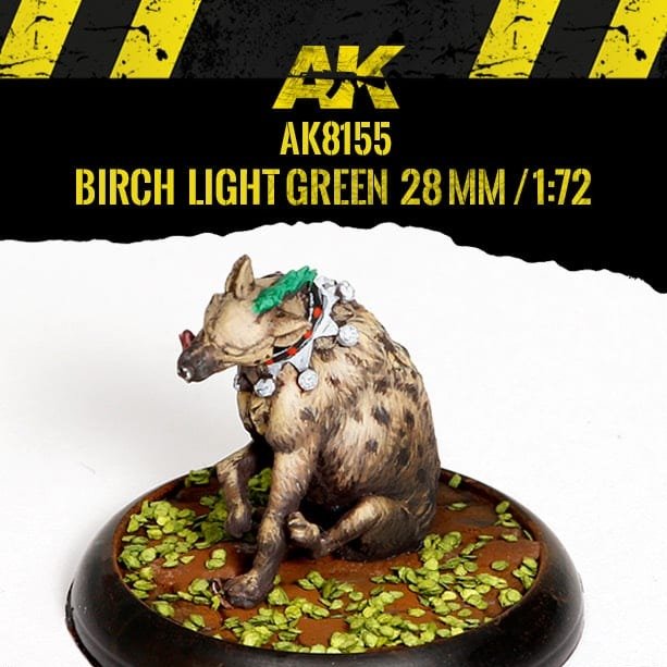 Painted hyena miniature on a base scattered with AK Interactive Birch Light Green Leaves