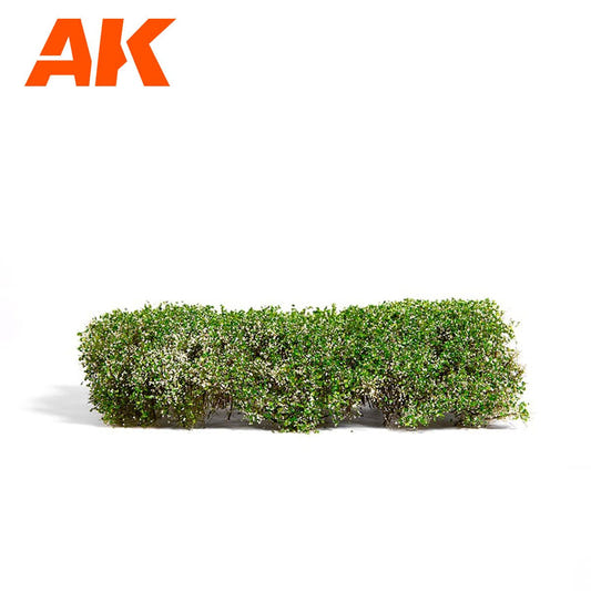 AK Interactive Blooming White Shrubberies, a leafy green shrub clump dotted with small white flowers