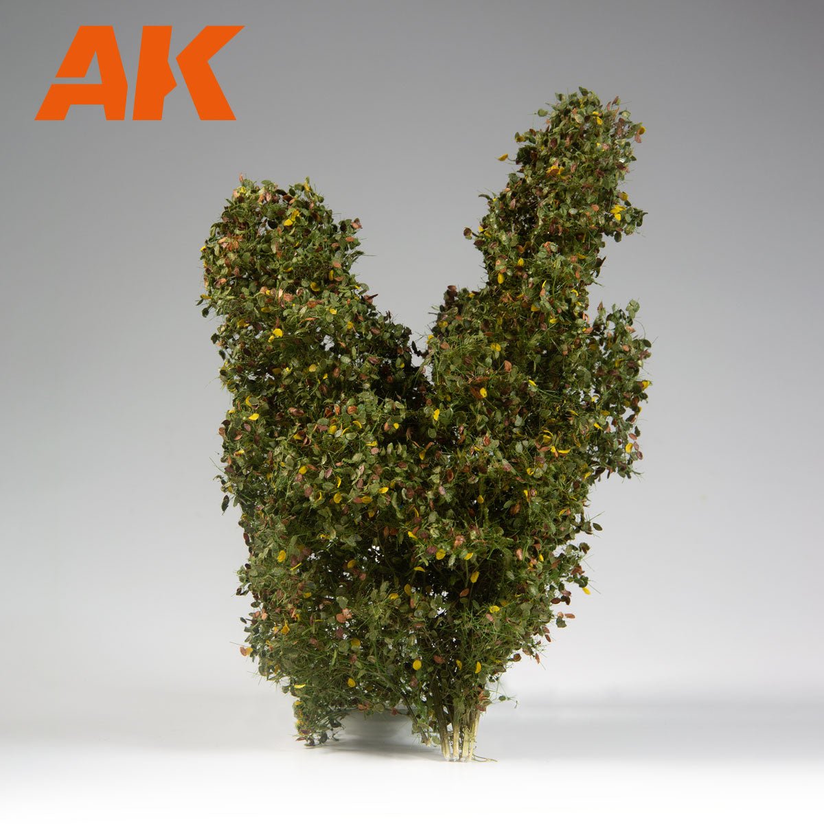 AK Interactive Early Fall Filigree Bushes 1:35 two-stemmed bush with green and yellow leaves, grey backdrop