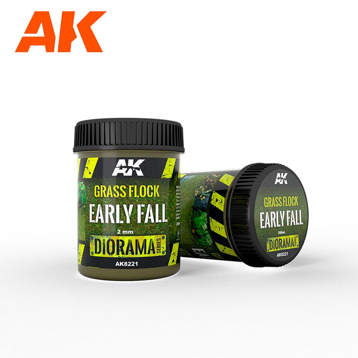 Two pots of AK Interactive Grass Flock 2mm Early Fall static grass for bases and dioramas