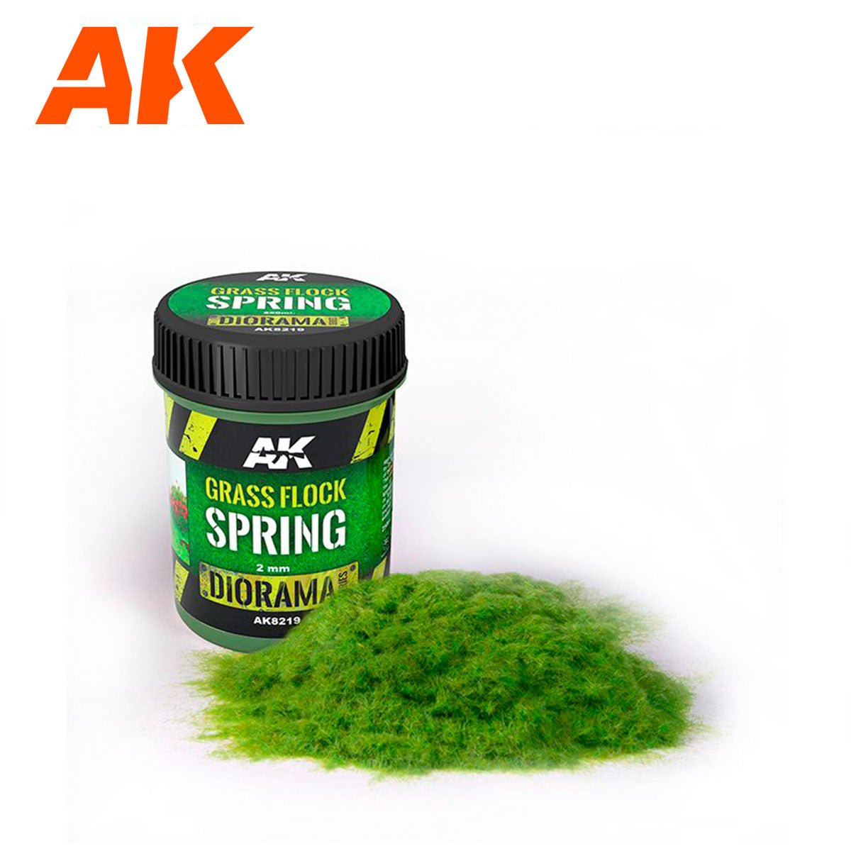 AK Interactive Grass Flock 2mm Spring AK8219 jar with a pile of fresh green static grass