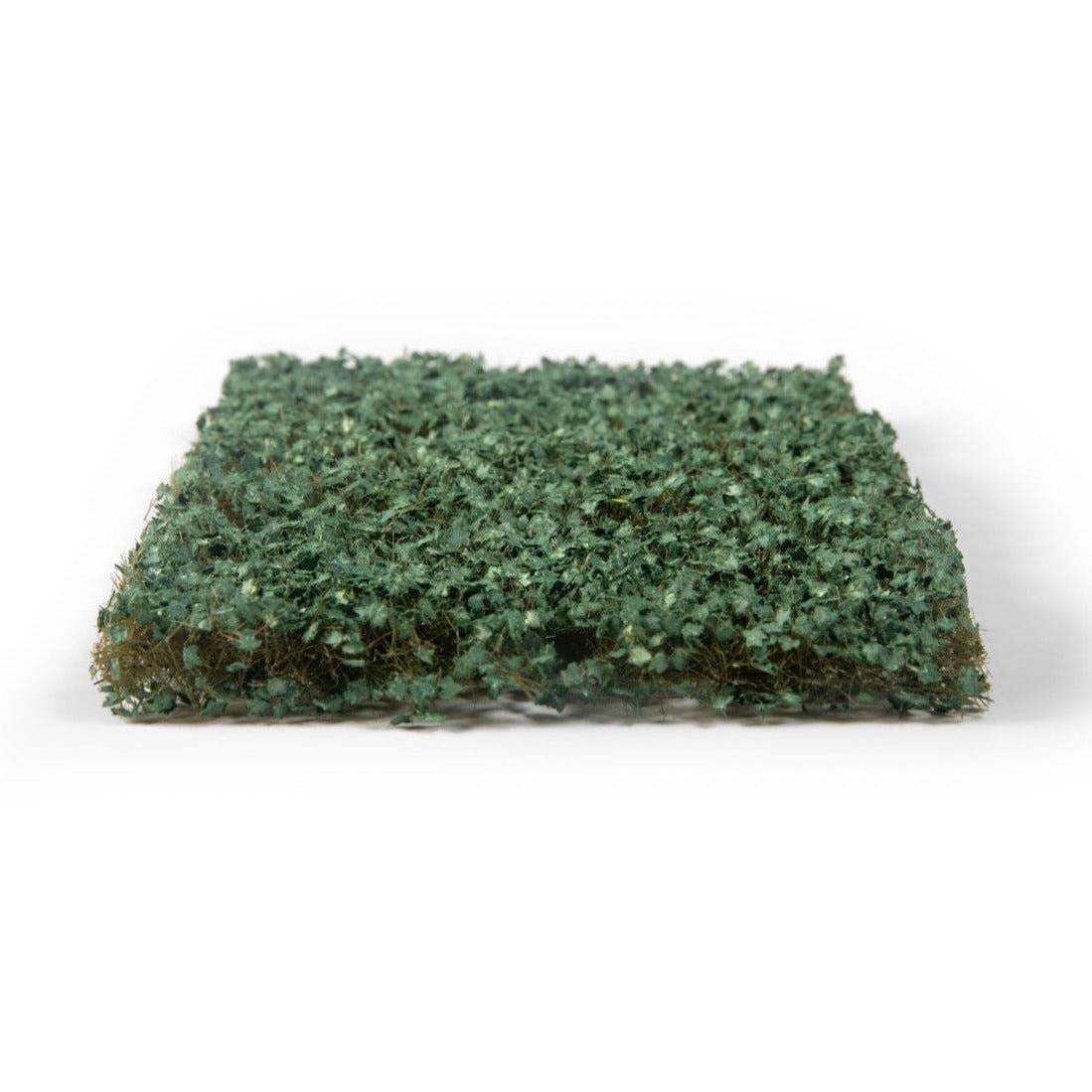 AK Interactive Ivy Foliage sheet at an angle showing the depth of the dark green leaves