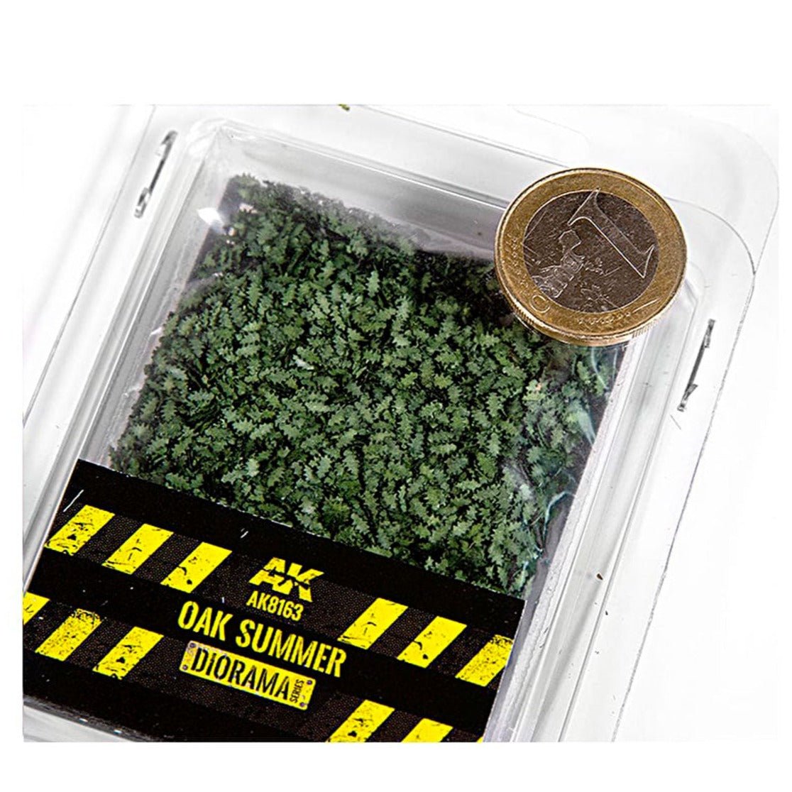 AK Interactive Oak Summer Leaves AK8163 tub of green scale leaves with a coin for size comparison