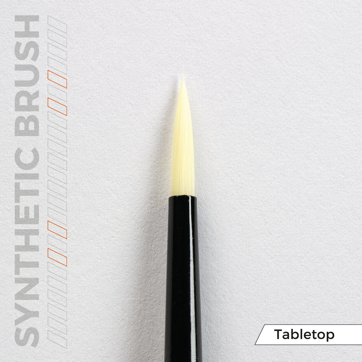 AK Interactive Tabletop synthetic brush, close-up of the largest pointed tip