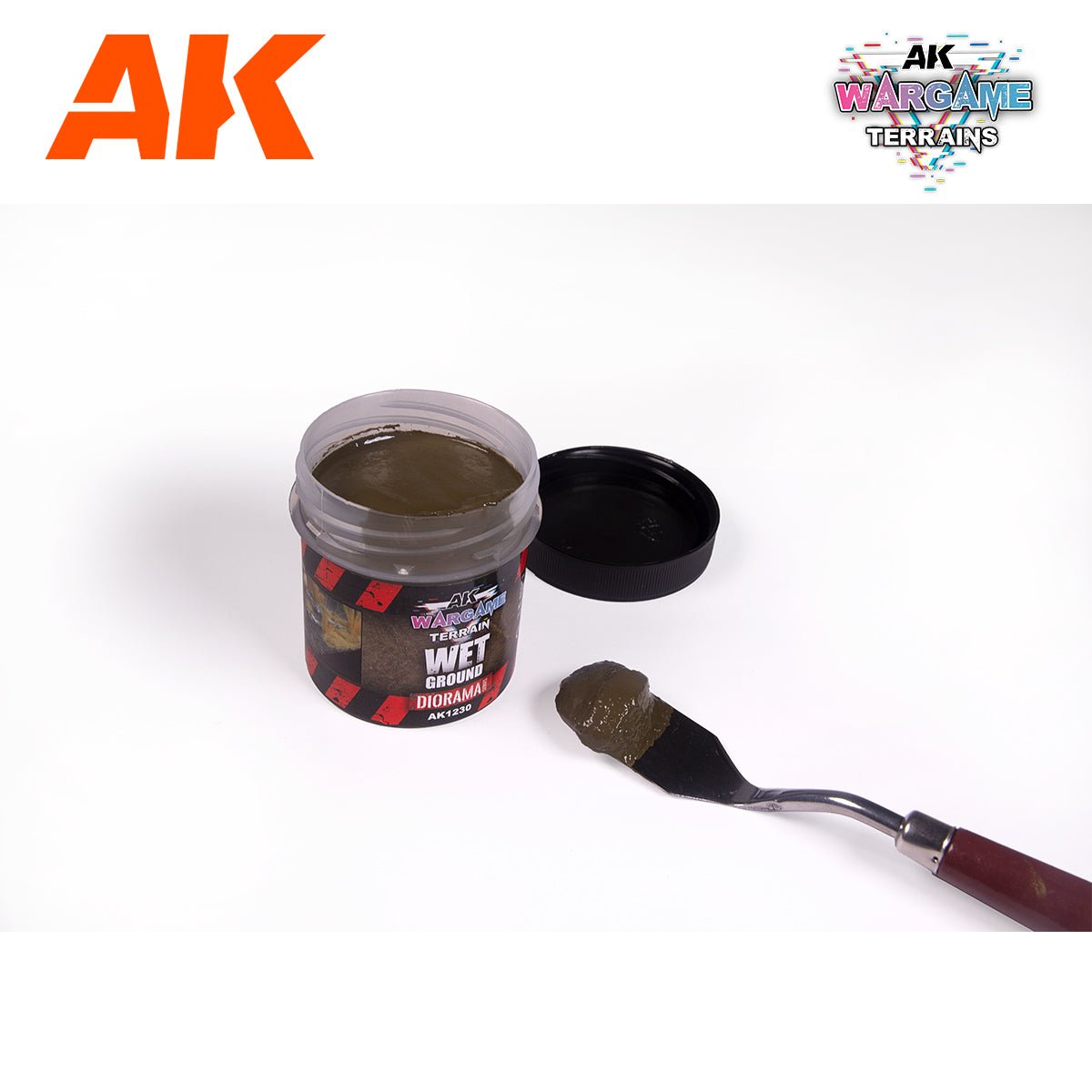 AK Interactive Wet Ground Wargame Terrains 100ml pot opened, with a spatula of dark paste