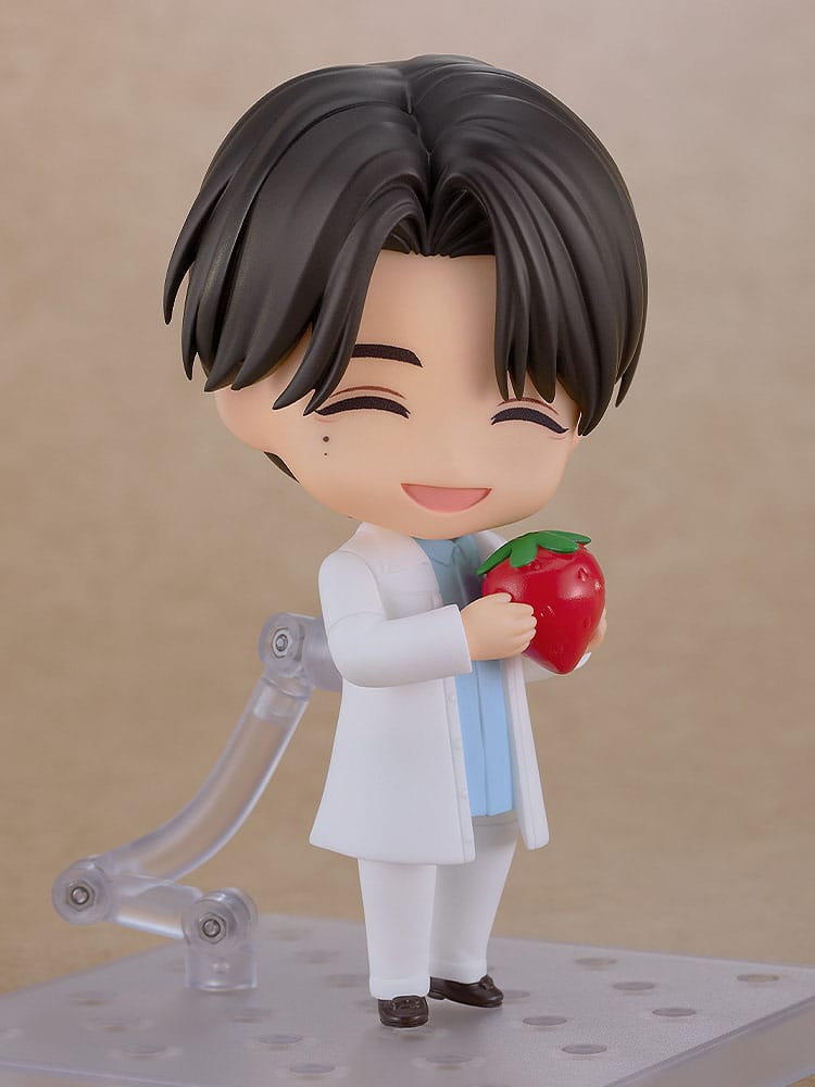 Nobunaga Shimazaki Nendoroid with happy faceplate holding a large strawberry