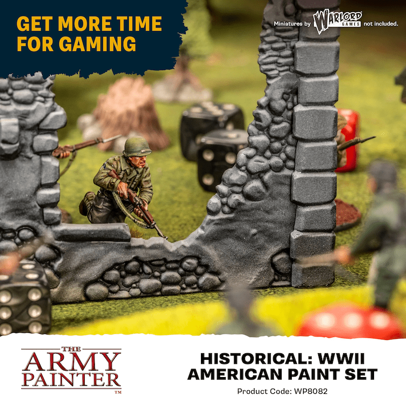 Painted WWII infantry miniature among ruined walls on a wargaming table, Army Painter Historical