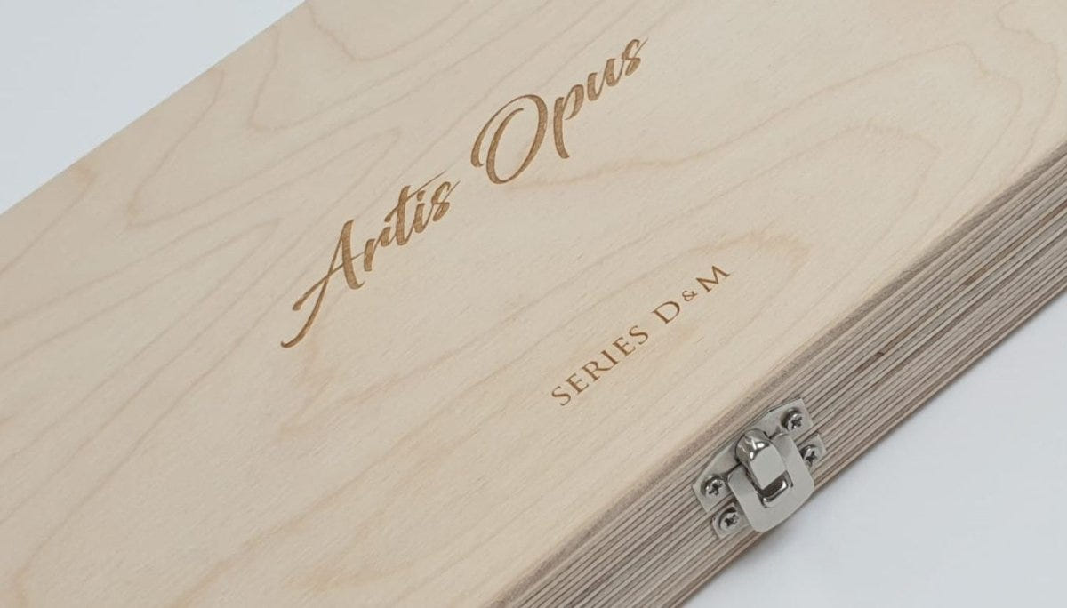 Artis Opus Series D and M wooden brush case lid with engraved logo, close-up
