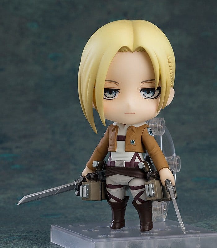 Nendoroid Annie Leonhart on stand in uniform with Vertical Maneuvering Equipment and blades