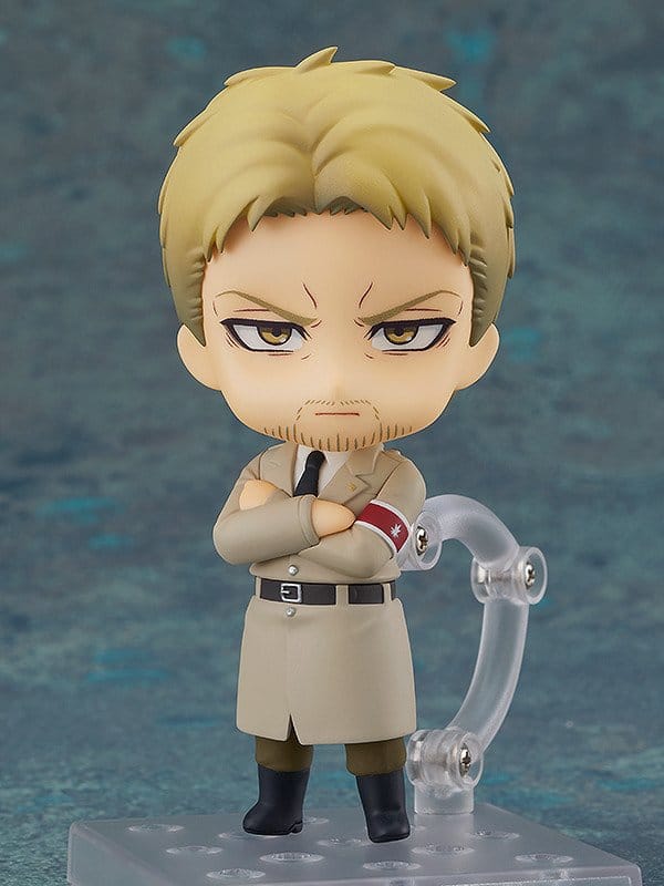 Nendoroid Reiner Braun on stand with arms crossed in beige Marley coat and armband