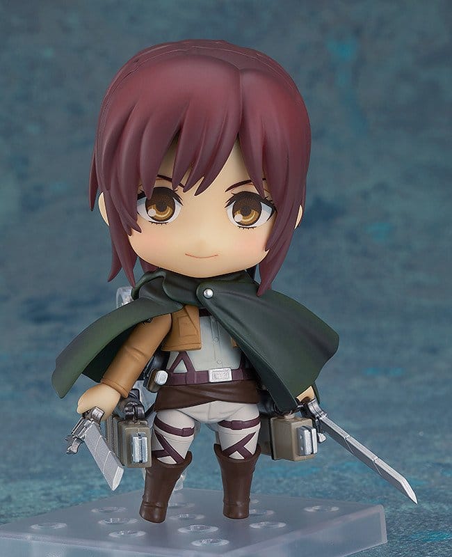 Nendoroid Sasha Braus on stand wearing green Survey Corps cloak, holding dual blades