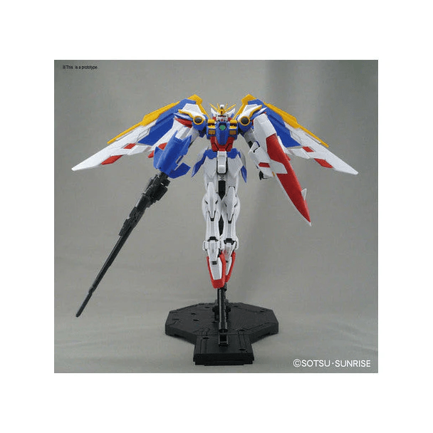 Bandai Master Grade Wing Gundam EW built model posed on its stand with wings spread