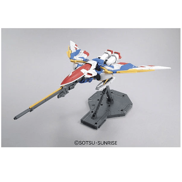 Bandai MG Wing Gundam EW 1/100 in bird mode transformation on a display stand