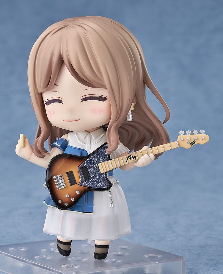 Soyo Nagasaki Nendoroid smiling with eyes closed, raising her bass pick hand