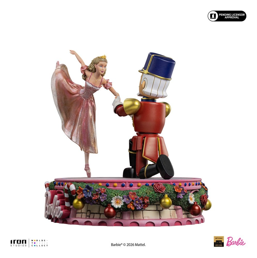 Barbie Nutcracker statue side view, Barbie dancing en pointe beside the Nutcracker