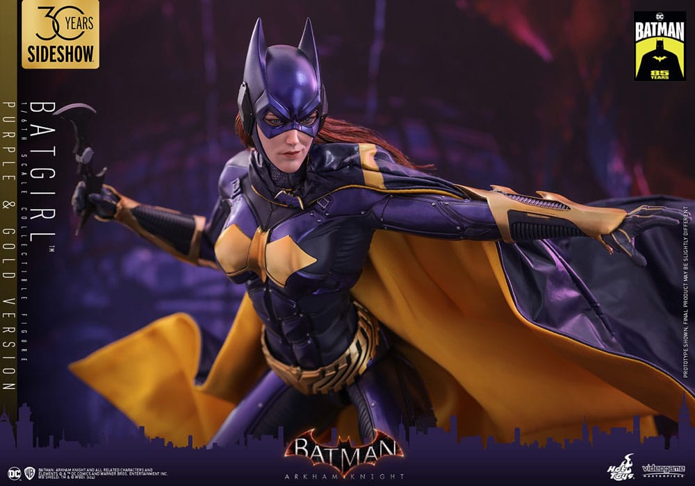 Hot Toys Batgirl Purple and Gold Version banner throwing a Batarang, gold-lined cape flowing