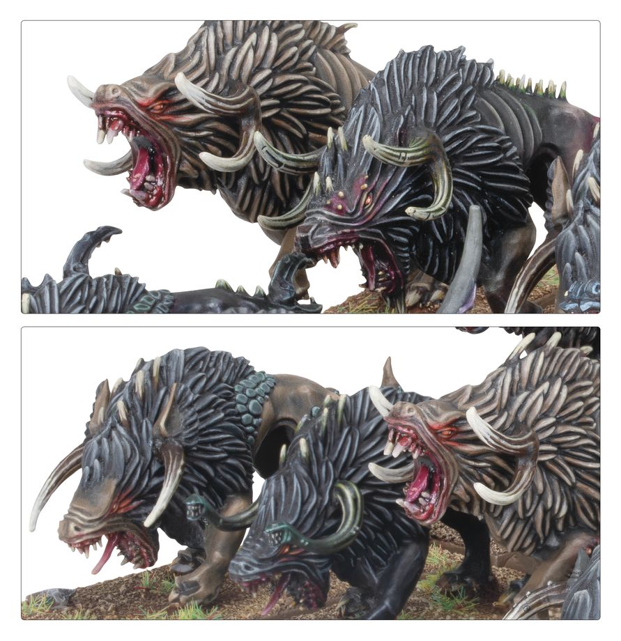 Close-ups of painted Chaos Warhounds with tusks and bristling dark fur