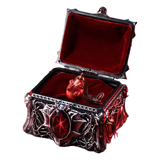 Prime 1 Studio Berserk Griffith's Behelit on its cord inside the open ornate silver chest