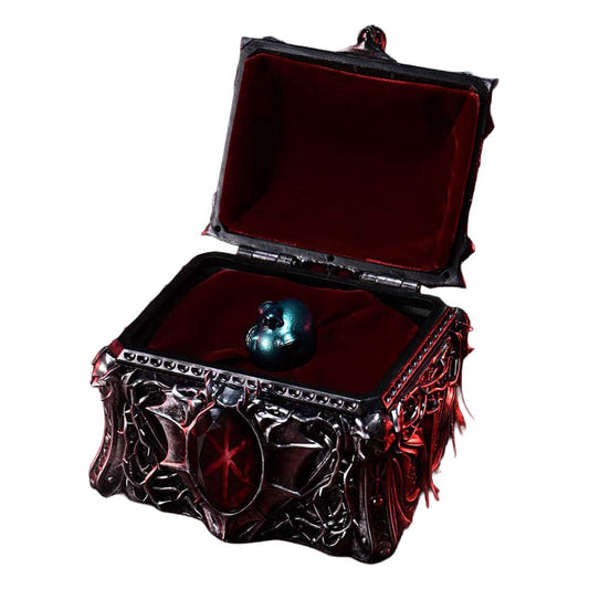 Prime 1 Studio Berserk Guts' blue-green Behelit inside the open ornate silver display chest