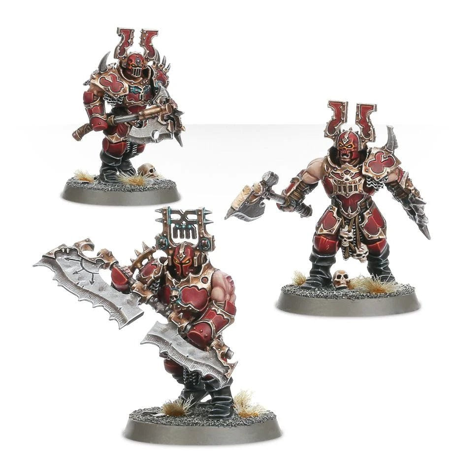 Three painted Blood Warriors including one wielding a large two-handed goreglaive