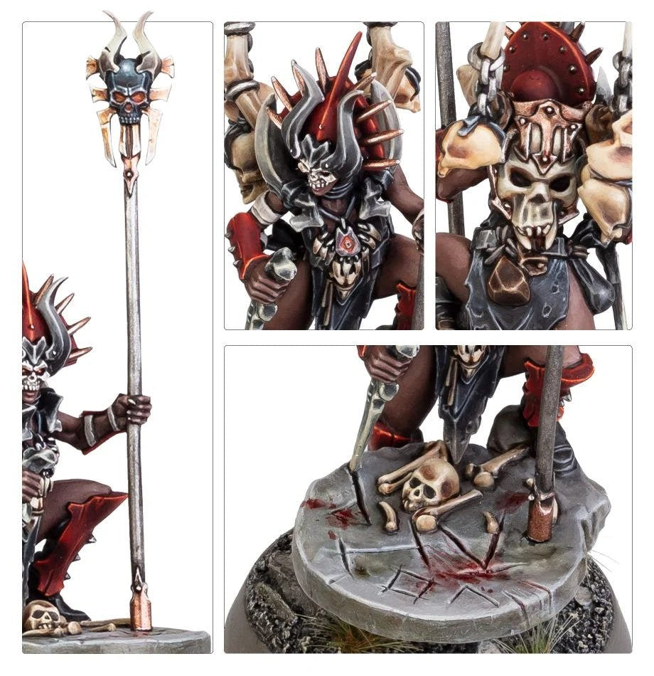 Close-up details of the painted Realmgore Ritualist: staff, horned helm, skull mask and bloody runes