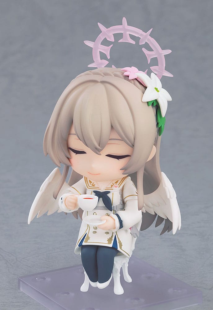 Nagisa Kirifuji Nendoroid seated with eyes closed, enjoying a cup of tea, side view