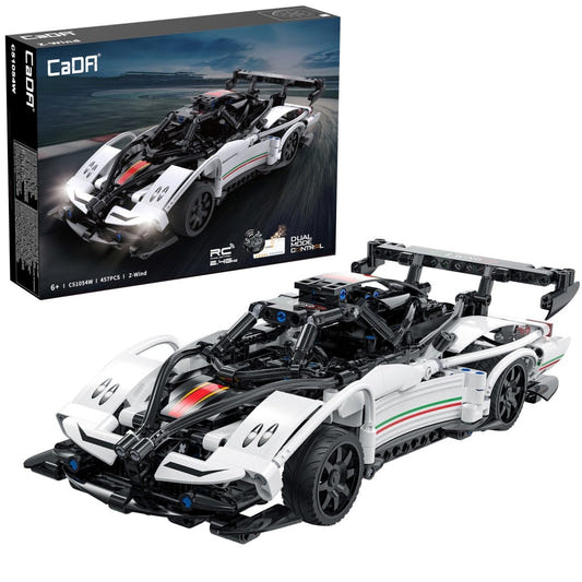 CaDA 1/14 RC Z-Wind Super Car brick kit in white and black with a rear wing, beside its box