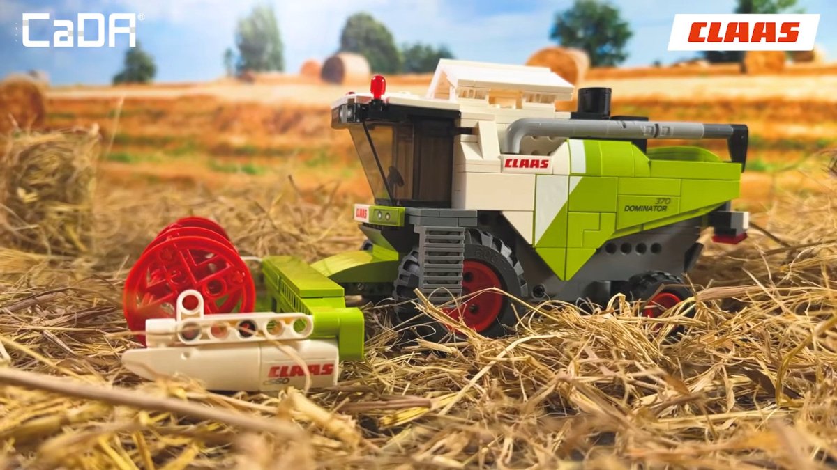 CaDA CLAAS Dominator 370 combine harvester brick kit, built combine among hay bales in a field