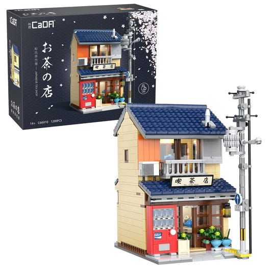 CaDA Japanese Kissaten Tea Shop brick building with blue tiled roof, vending machine and box