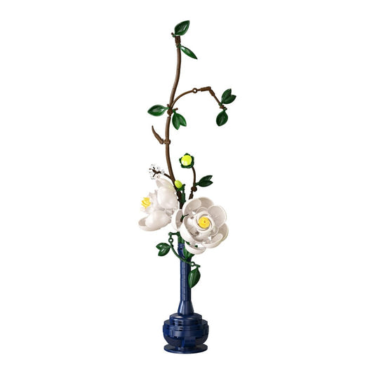 CaDA Oriental Floral Art Serene Indigo brick arrangement with white blooms in a navy vase