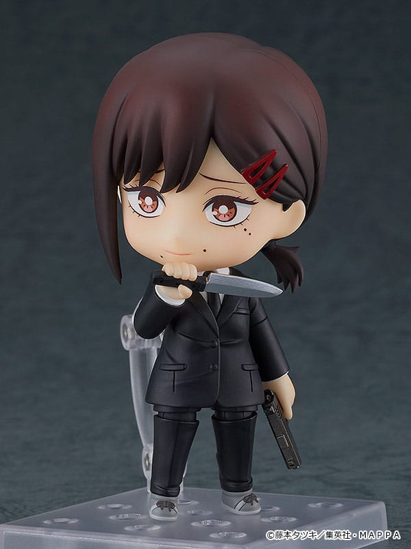Kobeni Nendoroid holding a knife to her mouth and a gun at her side