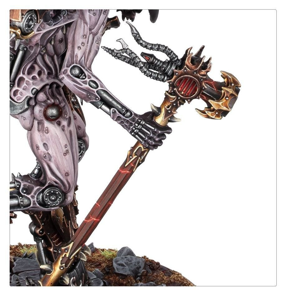 Close-up of Vashtorr's pale daemonic arm gripping his blacksmith's hammer