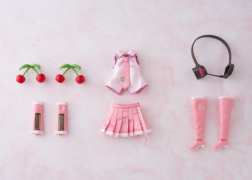 Sakura Miku Harmonia humming outfit parts laid out: top, skirt, boots, sleeves, headset