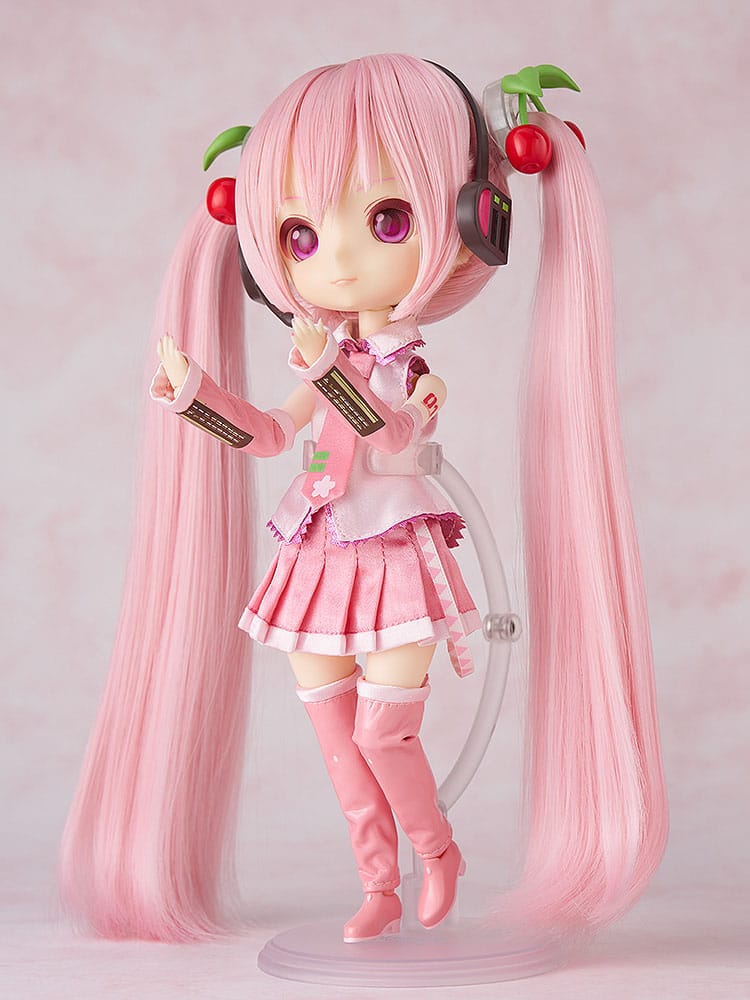 Sakura Miku Harmonia humming doll in a side-on pose with arm outstretched