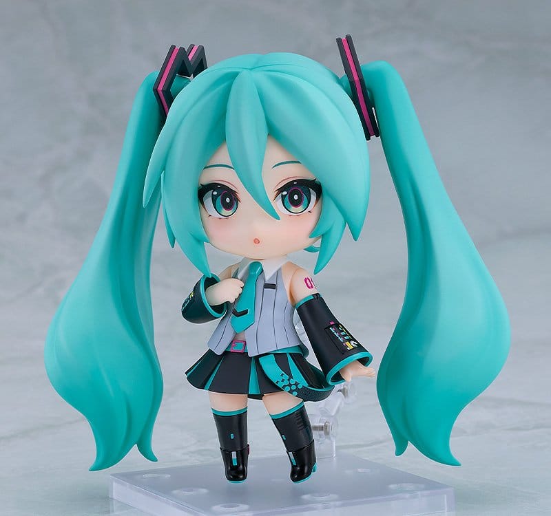 Nendoroid Hatsune Miku V6 on stand with awestruck face, hand to chest