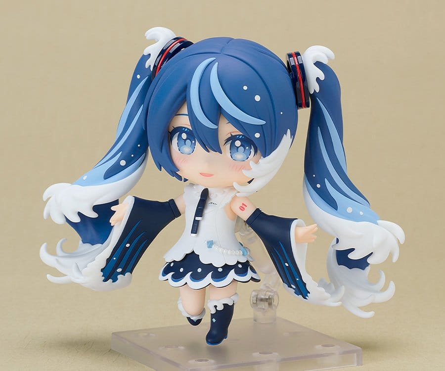 Nendoroid Hatsune Miku Hokusai Collaboration Ver. on stand, arms out and blue wave twintails flowing