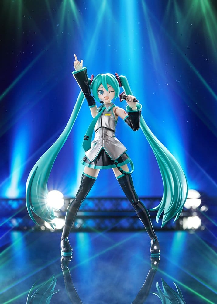 Hatsune Miku Plamatea kit singing with microphone on a blue concert stage backdrop