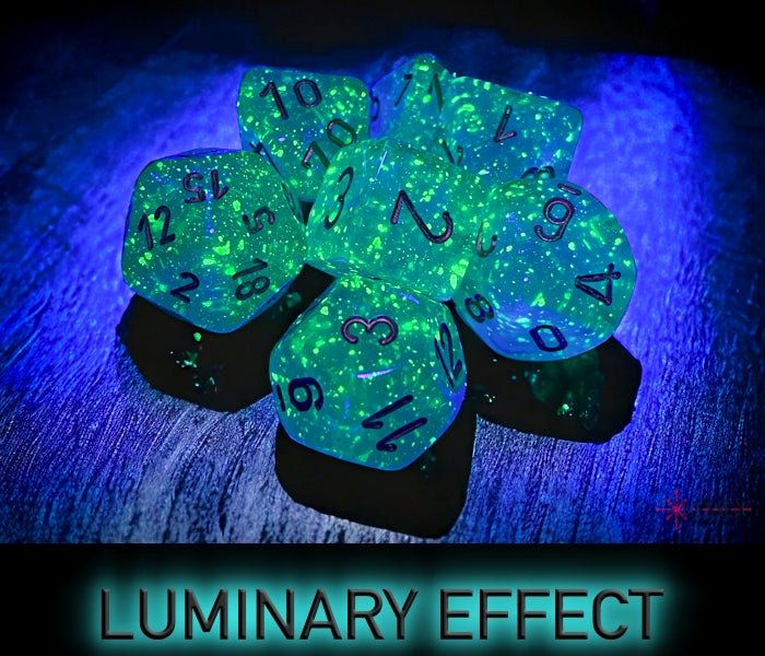 Chessex Borealis Luminary teal dice glowing green in the dark, showing the luminary effect