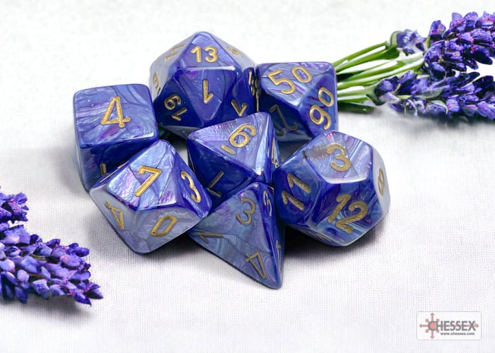 Chessex Lustrous Purple with Gold dice set beside sprigs of lavender