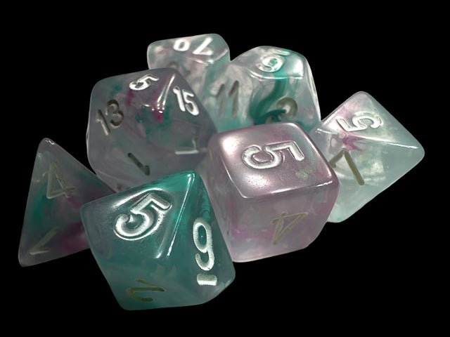 Close-up of Chessex Mini Nebula Wisteria dice on black, showing the swirling marbled finish