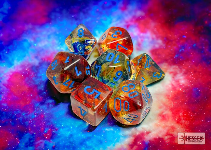 Chessex Nebula Luminary Primary dice set on a colourful galaxy background