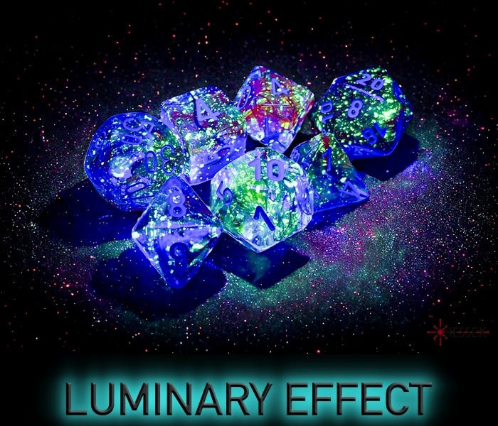 Chessex Nebula Luminary dice glowing in the dark, showing the luminary effect