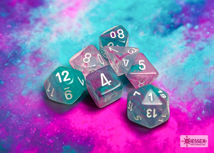 Chessex Nebula Wisteria dice set with white numbers on a pink and blue nebula backdrop